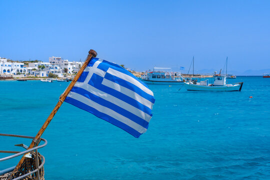 Greek flag on fishing boat, Koufonisi, Greece