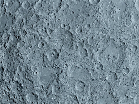 Closeup view of the moons rugged cratered surface texture