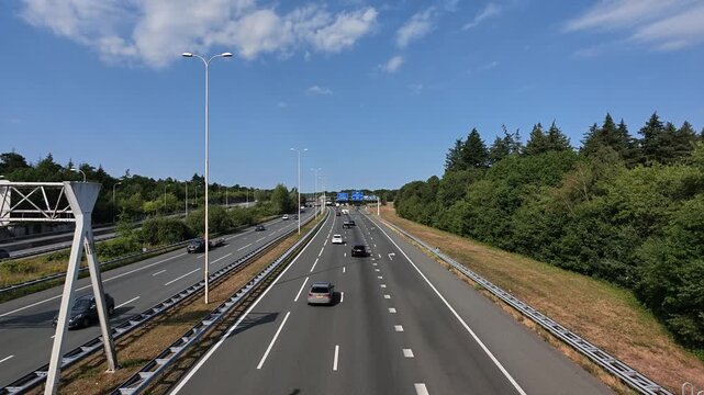 Aerial Perspective of Highway A28 Surrounded by Woodland