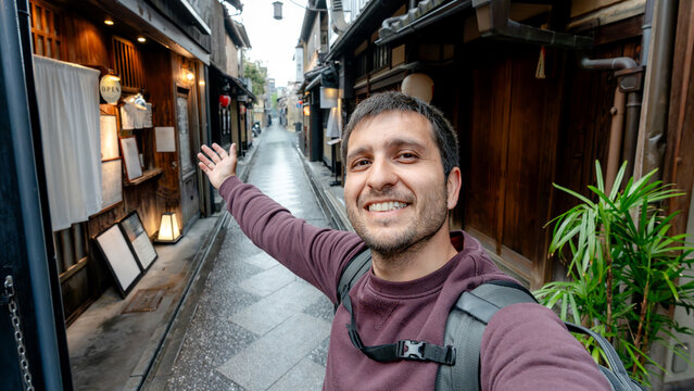 Tourist exploring the charming Pontocho Street in Kyoto