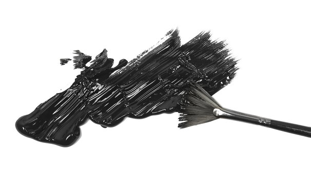 Brush and black paint smear isolated on white background, top view
