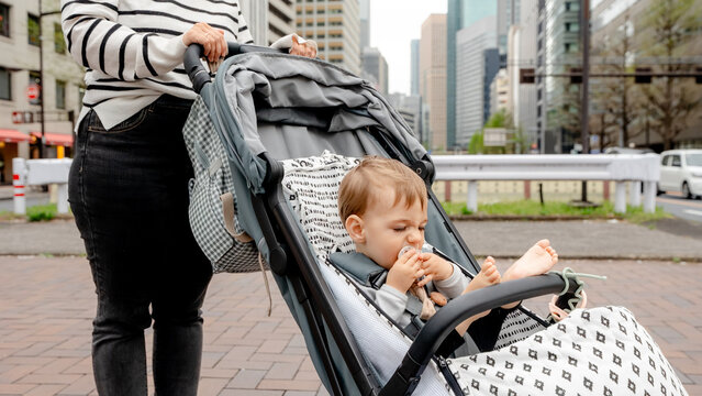 Baby in stroller exploring Ginza district in Tokyo