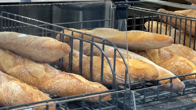 French baguettes in a bakery display basket