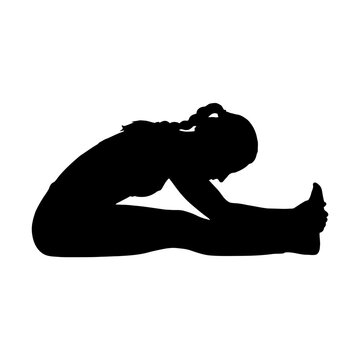 Woman doing yoga stretch in downward dog pose