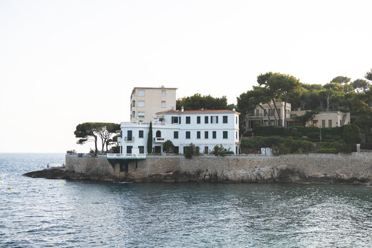 Cassis, France - 26 July 2026 :  Luxurious white seaside villa on the edge of Plage du Bestouan 