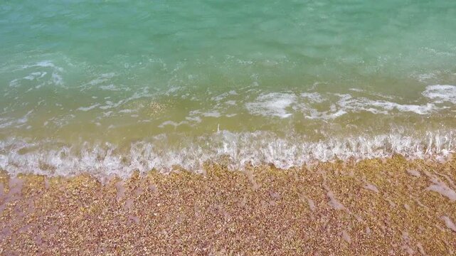Cream ice, ice fat on Azov Sea. In calm, frosty weather, even salt water freezes, pancake ice forms, and when pores filled, ice crystals merge into flexible mass that extinguishes waves. Foam hardens