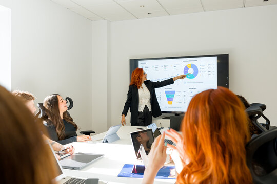 MBA students attend business analytics presentation in classroom