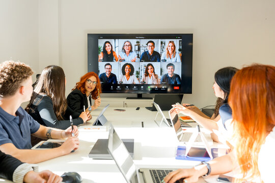 MBA students join virtual business meeting in classroom