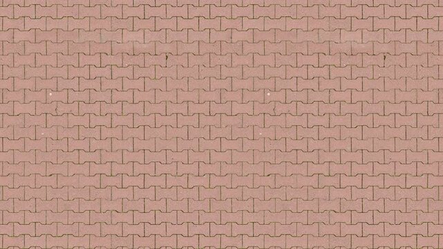 Terracotta interlocking pavers form a seamless loop pattern background.