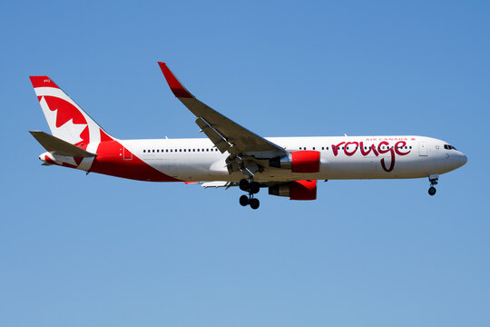 Air Canada Rouge Boeing 767-300ER (C-FIYA) on landing approach at Liszt Ferenc Airport on July 21, 2016 in Budapest, Hungary