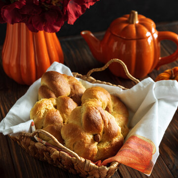 Autumn Harvest Scene With Golden Braided Bread Basket And Pumpkin Teapot