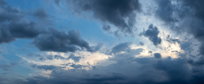 Dramatic sky with heavy dark clouds before storm panoramic view