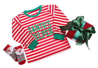 Fototapeta premium Christmas baby clothes. Sweater with phrase Santa's helper, socks and gift box on white background, top view