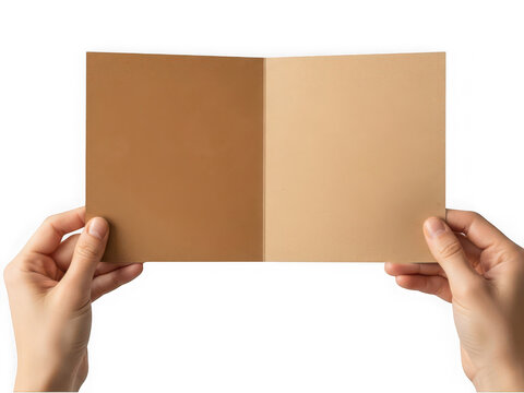 Hands holding an open blank brown craft paper card isolated on transparent background