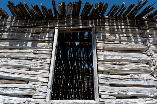 Wooden cabin view of roof through window