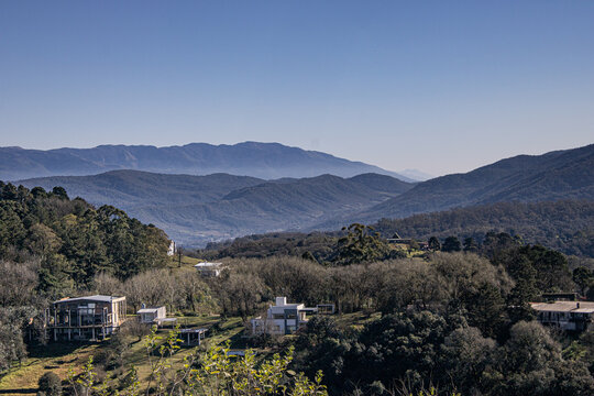 Mountain valley view with scattered houses in Tucuman hills, Argentina