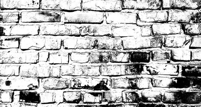 Close-up of the grunge texture of old brickwork with cracks and deep seams.