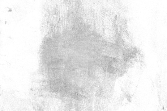 Grunge texture of a worn wall with scuffs, dust, and scratches close-up. Isolated background