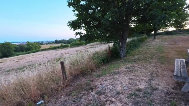 Sunset Panorama Over Rolling Countryside and Distant Coast, Lancing, UK - PANORAMIC VIDEO