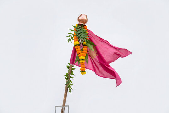 Gudhi padwa flag festival decoration against white sky