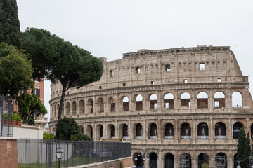 Obraz premium Architectural history in details of ruins, old buildings, walls, amfitheatres, arches in old part of Rome, dated from 300 BC, guided tours in Rome, Italy