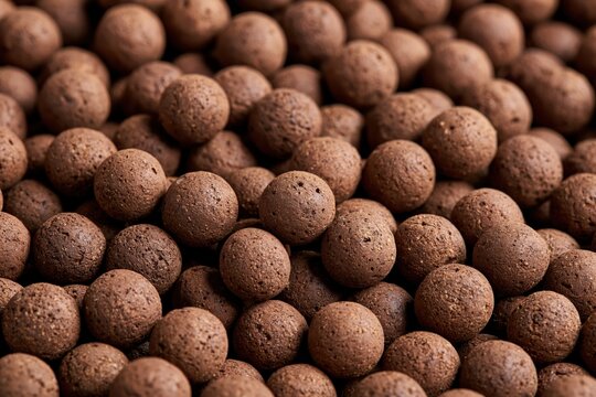 Macro shot captures texture of premium expanded clay pebbles filling the frame for hydroponic use