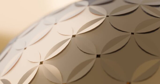 Layered paper circle pattern in warm beige tones looping video