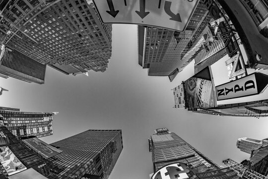 neon advertising of News, brands and theaters at times square in late afternoon. Times square is a symbol for New York life and amusement
