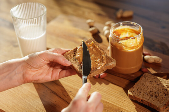 Peanut Butter Spread On Whole Grain Toast For Simple Breakfast