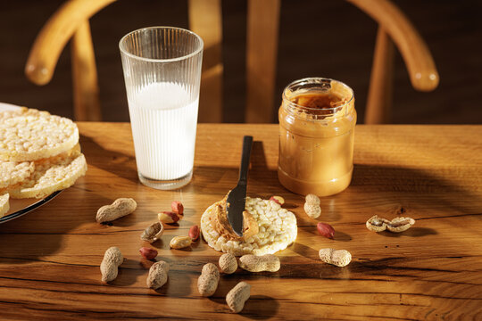 Peanut Butter Spread On Rice Cake With Milk For Snack