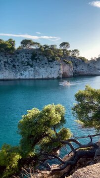 Rocky cove with a boat on the Cote d'Azur, France