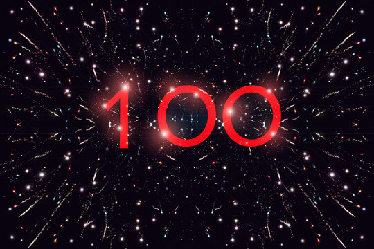 Die Zahl 100 Jahre vor einem Nachthimmel mit vielen Glitzerpunkten und Raketen. 100 Jahre Jubil&auml;um