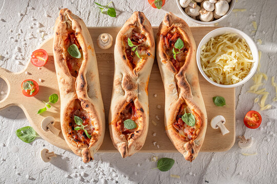 Delicious and healthy fruste Margherita freshly baked in oven.