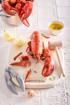 Teasty and fresh lobster with tongs and hammer to crack.