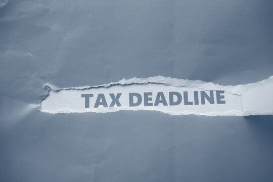 The tax payment deadline is written under the torn paper.
