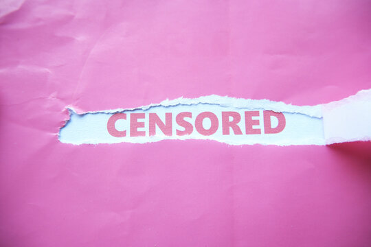 The words "CENSORED" are written on the back of torn paper. A warning for content or something that should not be shown to the public.