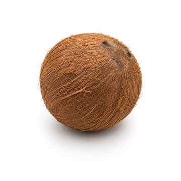 Whole coconut isolated on white background