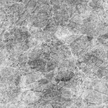 Closeup Texture of Natural Weathered Stone Surface Showing Intricate Cracks and Patterns