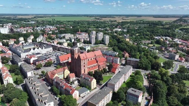 Stargard Poland city center church parks apartments circle 1. Northern Poland in 8th century. Historical stronghold, defensive walls, gates towers. WW II POW camp controlled by Germany. Brick church.