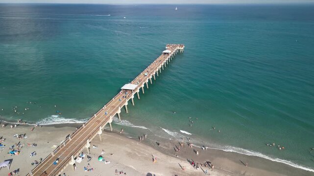 Still shot looking down over Juno Beach Pier near Jupiter in Palm Beach County, Florida. 