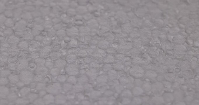 soft white foam for storage, foam sheet made of small soft balls for storing objects and transporting them, extreme close up