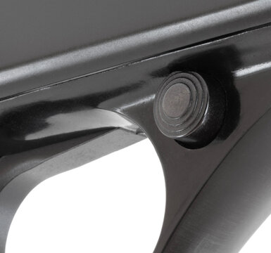 Cross-bolt safety on a shotgun seen up close