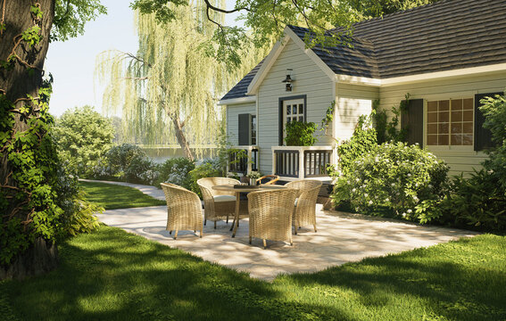 Cozy white cottage house surrounded by lush green forest garden