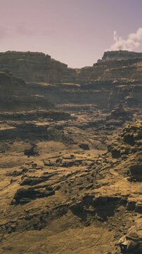 Breathtaking rocky terrains create a stunning backdrop. Unique formations glow under warm sunset hues, highlighting natures artistry and rugged beauty in this serene environment.