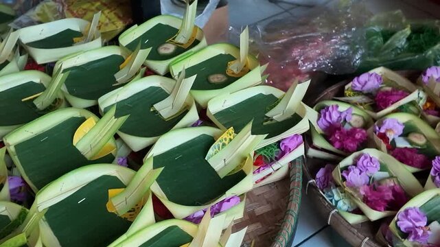 Traditional Balinese Canang Sari Offerings Made from Palm Leaves and Flowers