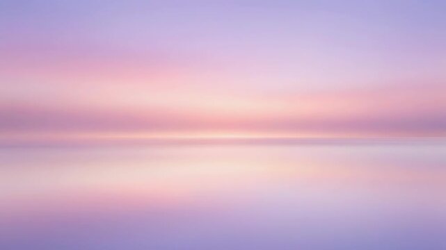 Soft pastel gradient sky with pink, purple, and blue hues at sunrise or sunset