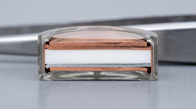 Detailed Cross Section of Solid-State Battery Cell with Copper Current Collectors and Solid Electrolyte Core