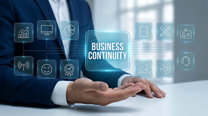 Fototapeta premium Businessman presenting business continuity concept on virtual screen interface