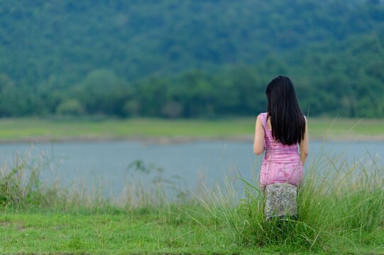 Young Woman in Pink Outfit at Sai Thong Reservoir in Nakhon Nayok