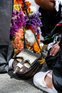 Traditional Colombian Leather Carriel Bag and Colorful Flowers at the Flower Festival Parade in Medellin Colombia